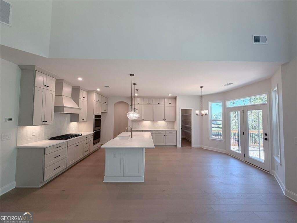 5 bedroom, 3.5 bathroom, 3,640 sq ft single family residence for sale at 167 Wood Grove Lane, Canton, GA 30114 — photo 4