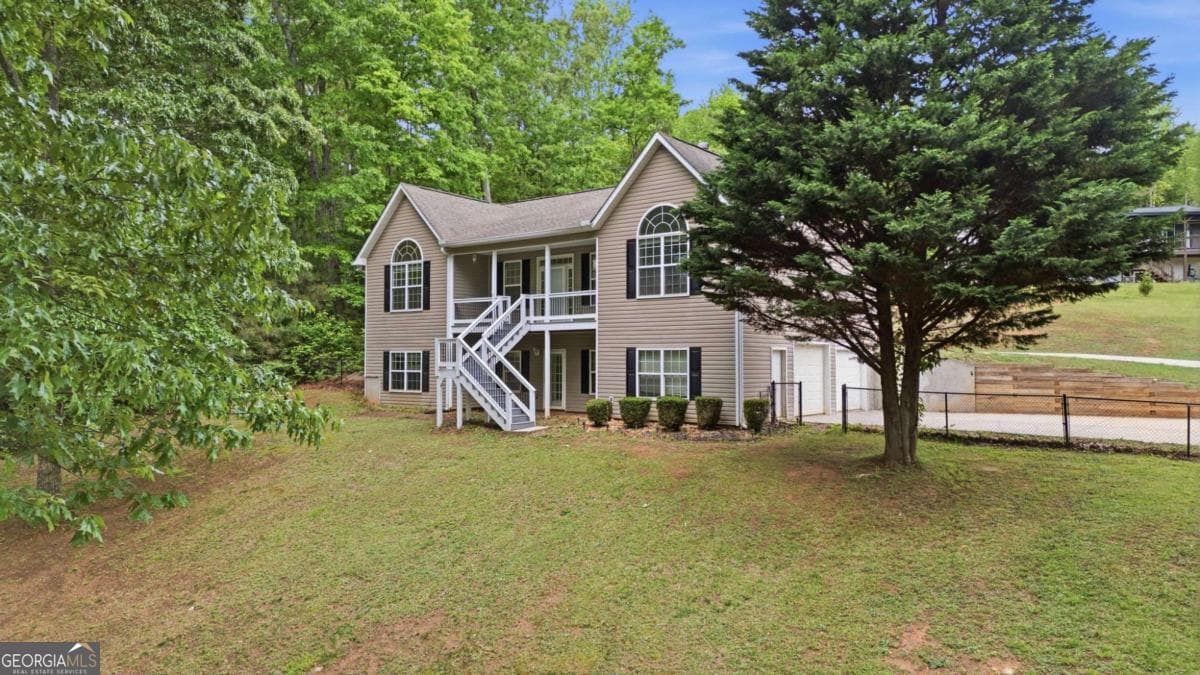 5 bedroom, 3 bathroom, 2,503 sq ft single family residence sold at 7161 Freeman Road, Cumming, GA 30028