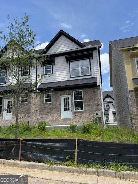 3 bedroom, 3.5 bathroom townhouse for sale at 1959 Hollywood Road 22, Atlanta, GA 30318 — photo 1 of 29