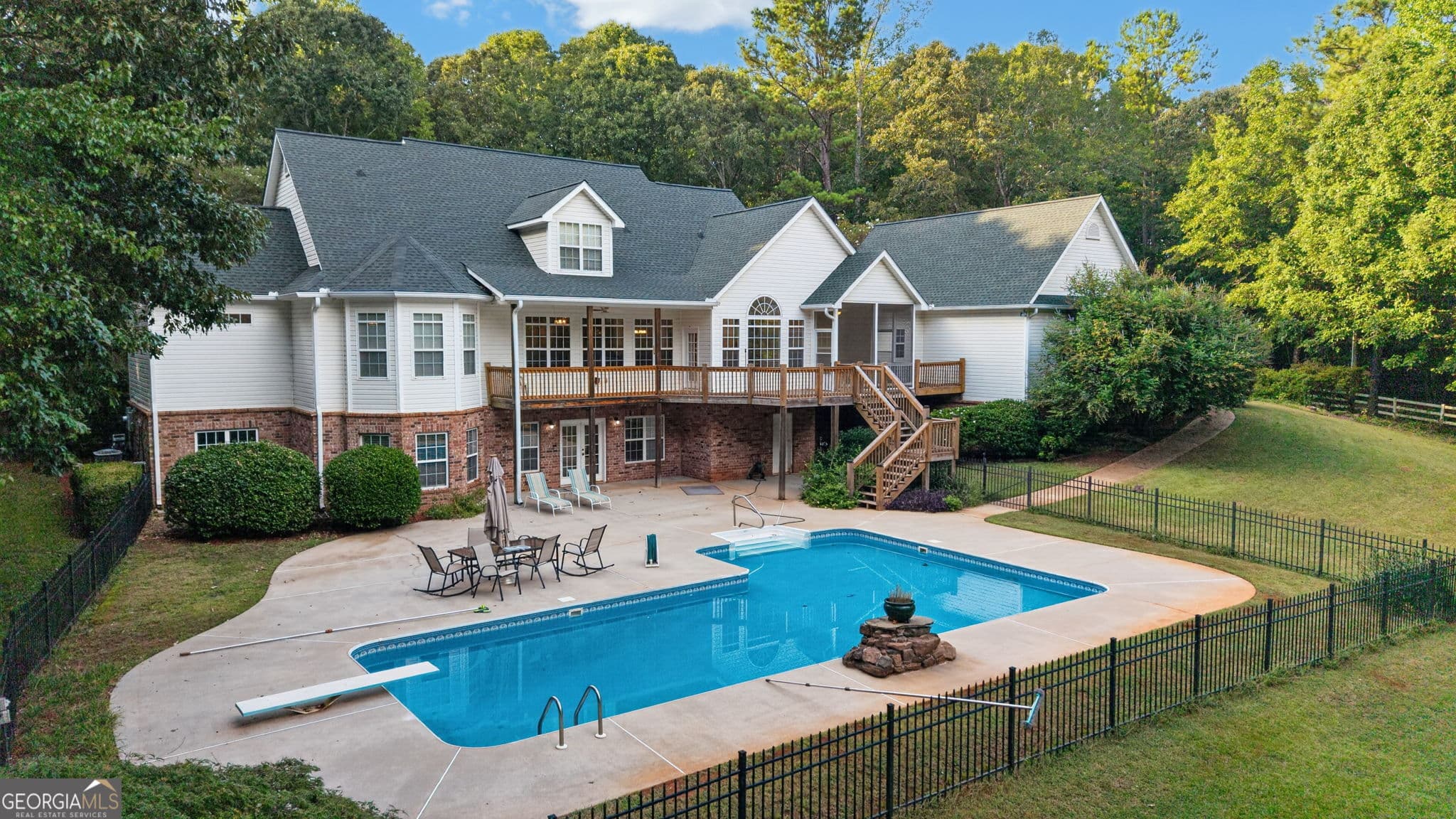 6 bedroom, 4.5 bathroom, 6,844 sq ft single family residence for sale at 738 Old Greenville Road, Fayetteville, GA 30215 — photo 3