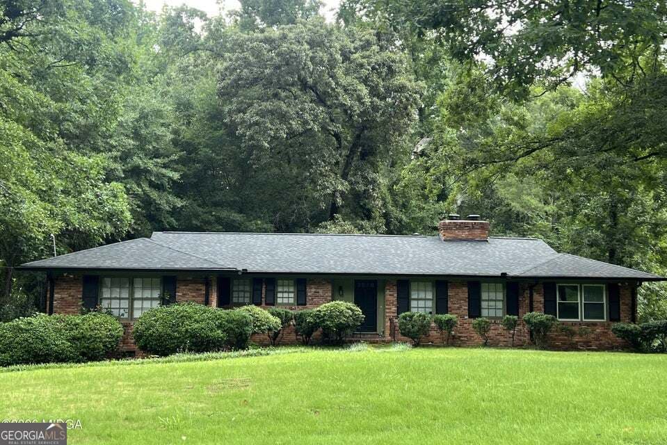 4 bedroom, 2.5 bathroom, 2,673 sq ft single family residence for sale at 4915 Wesleyan Drive, Macon, GA 31210