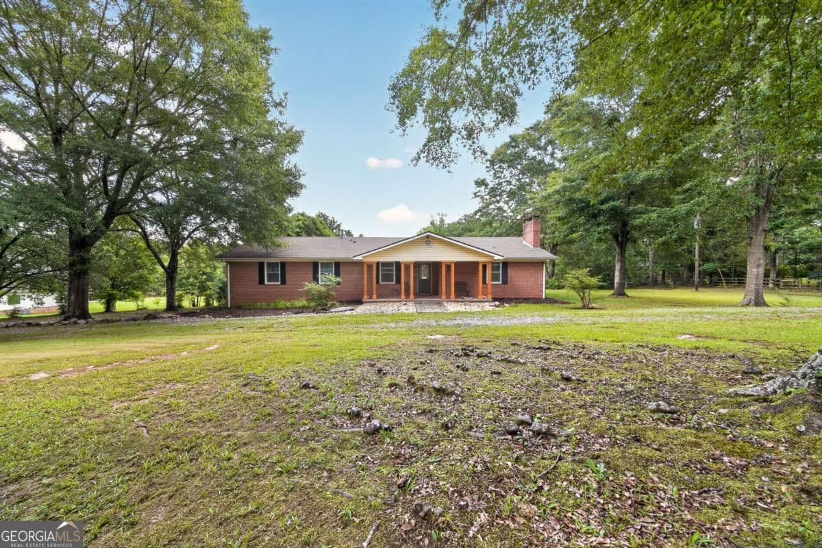 5 bedroom, 4 bathroom, 4,668 sq ft single family residence for sale at 9406 Whitesville Road, Columbus, GA 31904 — photo 2