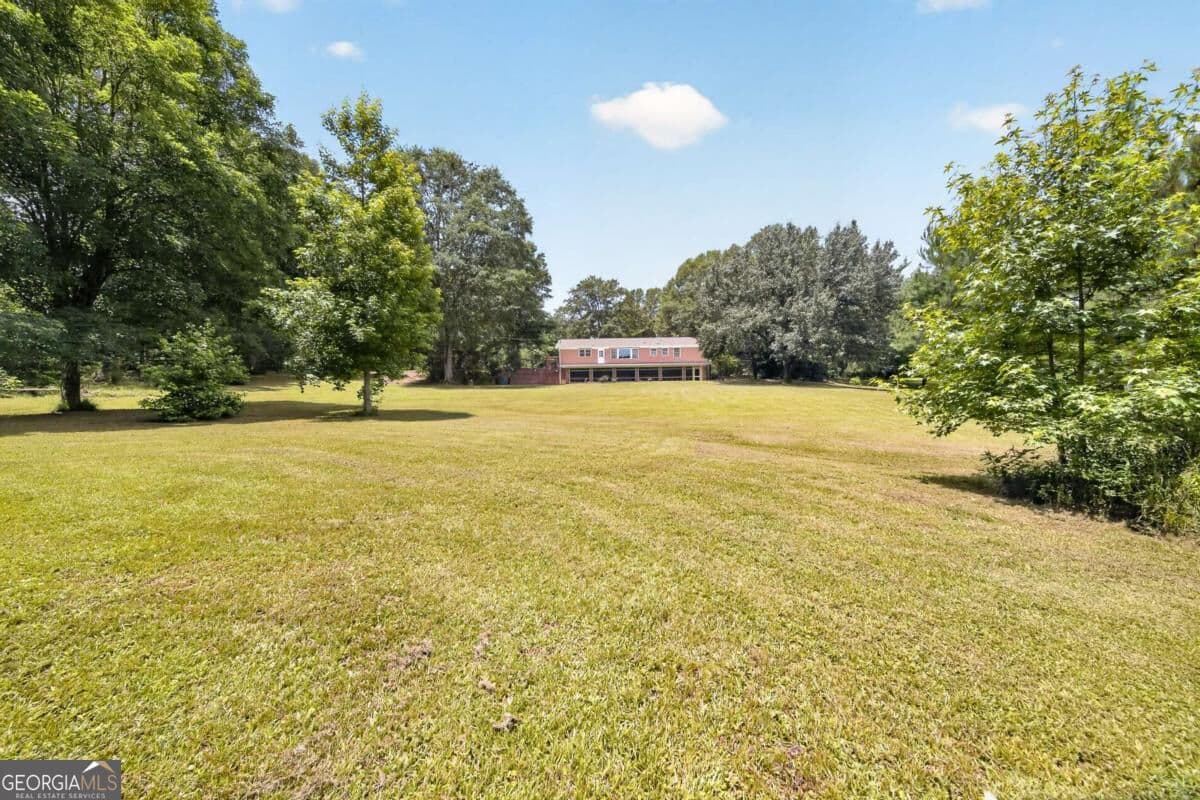 5 bedroom, 4 bathroom, 4,668 sq ft single family residence for sale at 9406 Whitesville Road, Columbus, GA 31904 — photo 6