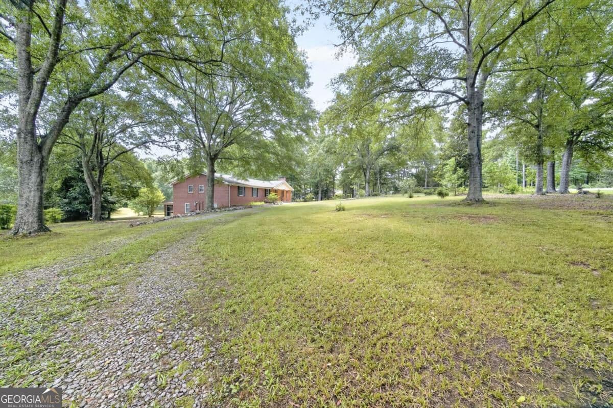 5 bedroom, 4 bathroom, 4,668 sq ft single family residence for sale at 9406 Whitesville Road, Columbus, GA 31904 — photo 3