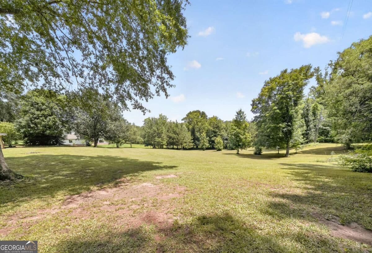 5 bedroom, 4 bathroom, 4,668 sq ft single family residence for sale at 9406 Whitesville Road, Columbus, GA 31904 — photo 5
