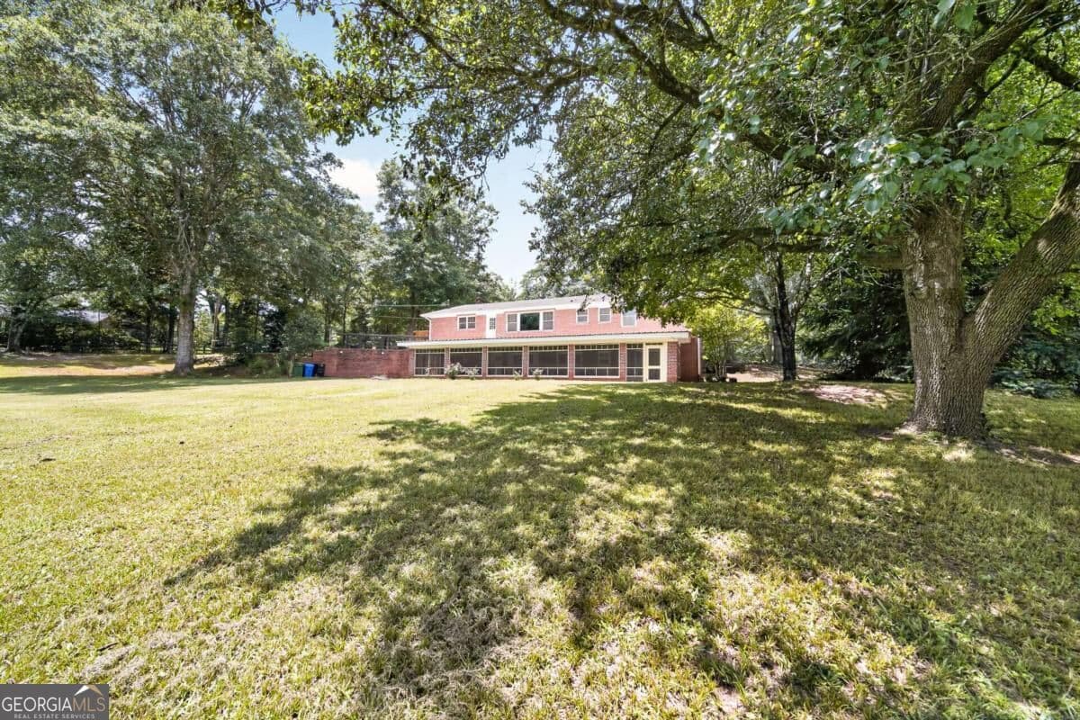 5 bedroom, 4 bathroom, 4,668 sq ft single family residence for sale at 9406 Whitesville Road, Columbus, GA 31904 — photo 9