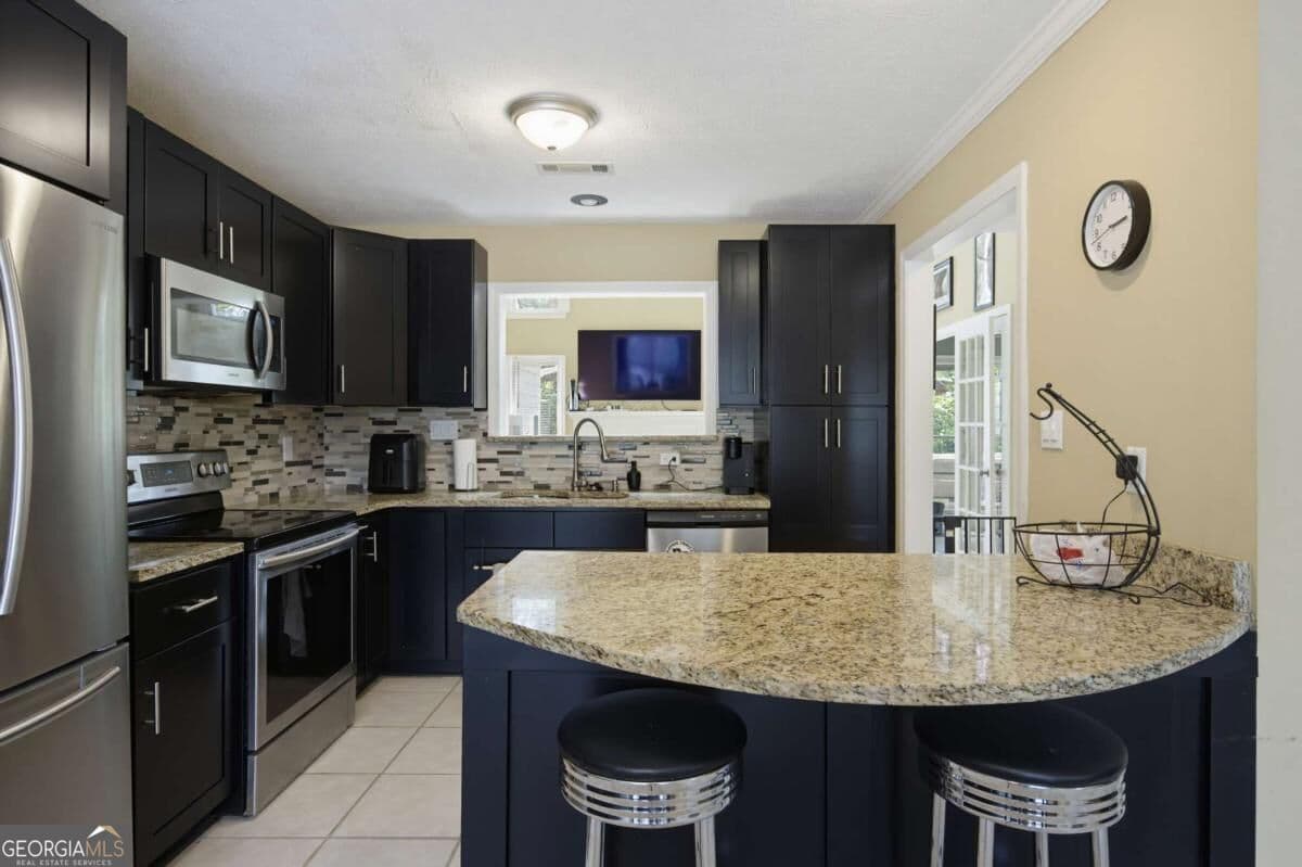 2 bedroom, 2 bathroom, 1,444 sq ft townhouse for sale at 5010 Avalon Drive, Alpharetta, GA 30005 — photo 9