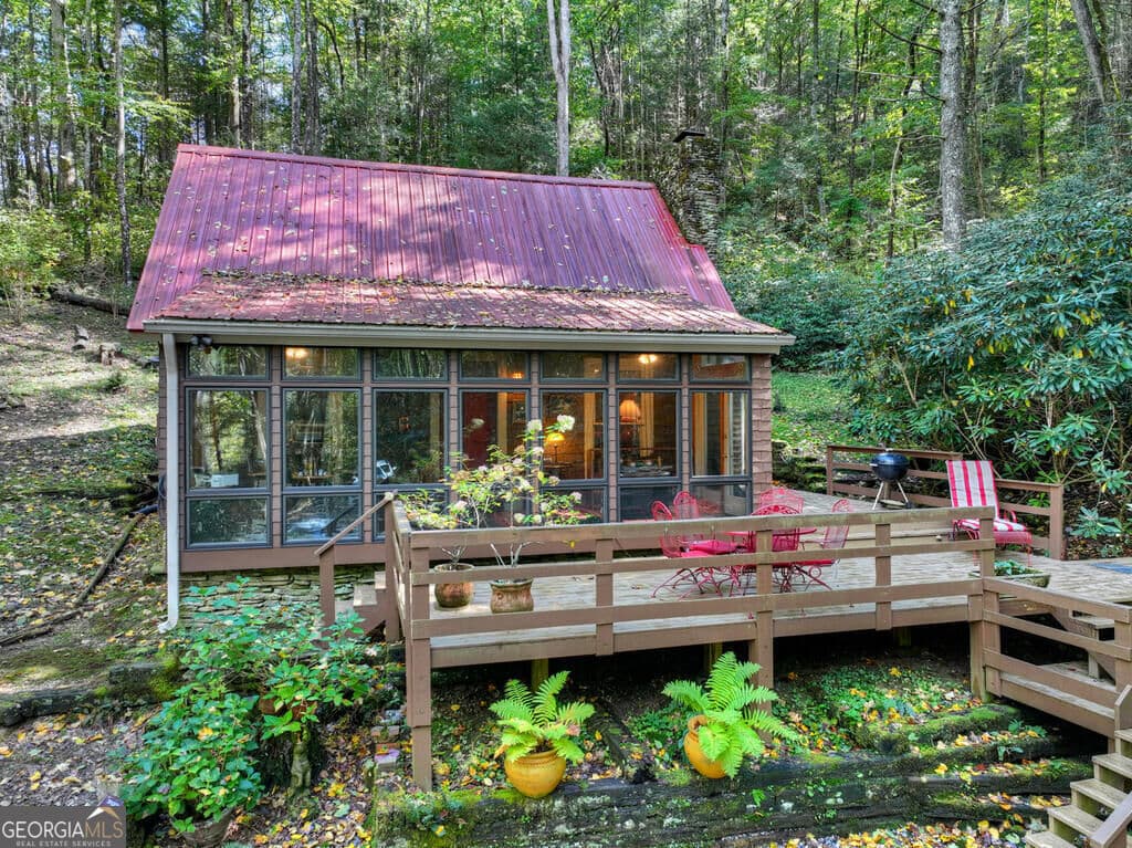 2 bedroom, 1 bathroom, 850 sq ft cabin,single family residence for sale at 931 Foster Branch Road, Epworth, GA 30541 — photo 1 of 40