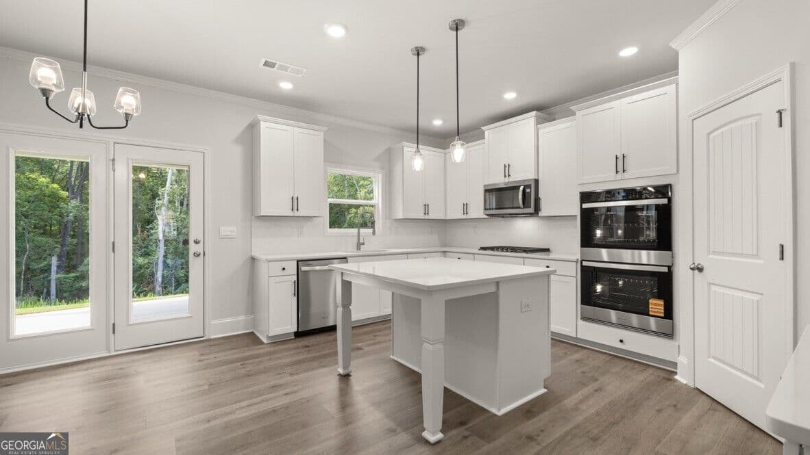 5 bedroom, 4 bathroom, 3,363 sq ft single family residence for sale at 7174 Bocholt Drive, South Fulton, GA 30349 — photo 7
