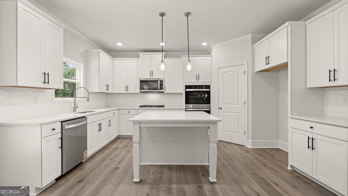 5 bedroom, 4 bathroom, 3,363 sq ft single family residence for sale at 7174 Bocholt Drive, South Fulton, GA 30349 — photo 8