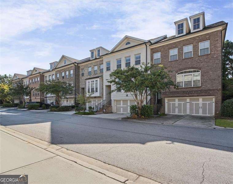 4 bedroom, 3.5 bathroom, 1,718 sq ft townhouse for sale at 1781 Kenstone Walk, Dunwoody, GA 30338 — photo 2