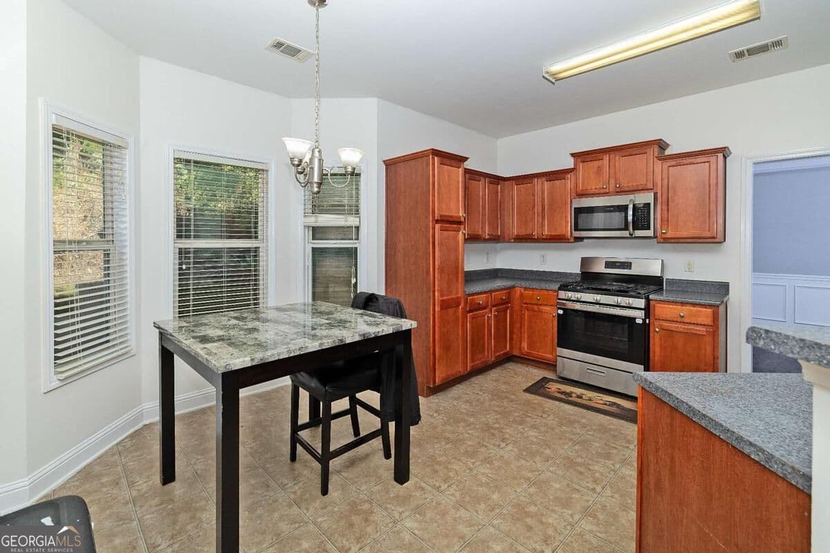 4 bedroom, 2.5 bathroom single family residence for sale at 702 Lynnfield Drive, Lawrenceville, GA 30045 — photo 7