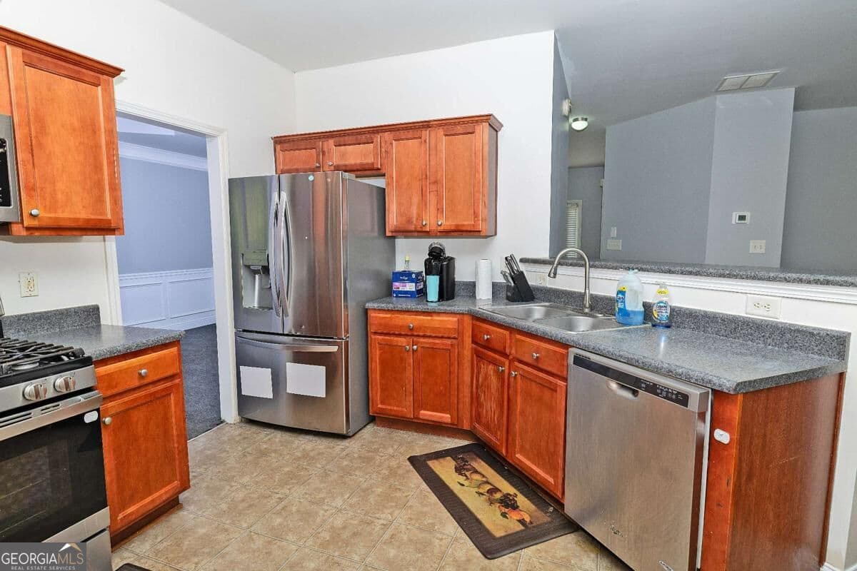 4 bedroom, 2.5 bathroom single family residence for sale at 702 Lynnfield Drive, Lawrenceville, GA 30045 — photo 9