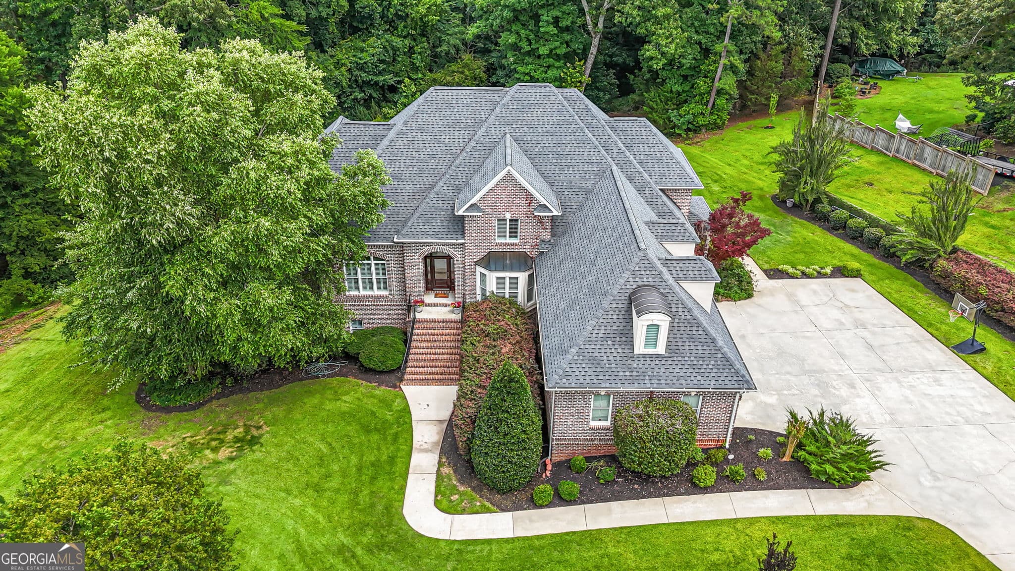 6 bedroom, 4.5 bathroom, 6,420 sq ft single family residence for sale at 105 Steeplechase Run, Warner Robins, GA 31088 — photo 3