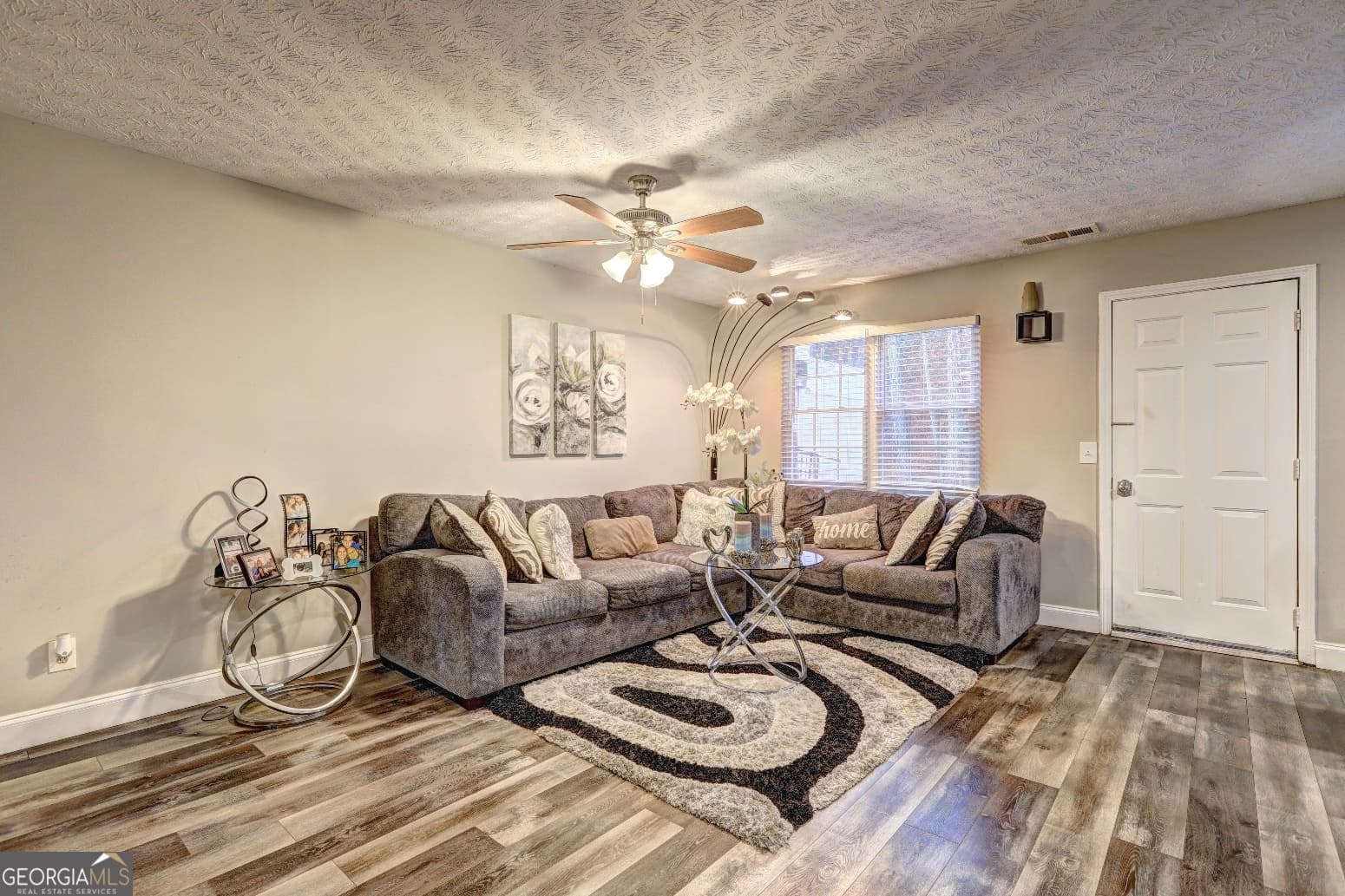 3 bedroom, 2.5 bathroom, 1,112 sq ft townhouse for sale at 7706 Bernardo Drive, Riverdale, GA 30296 — photo 2