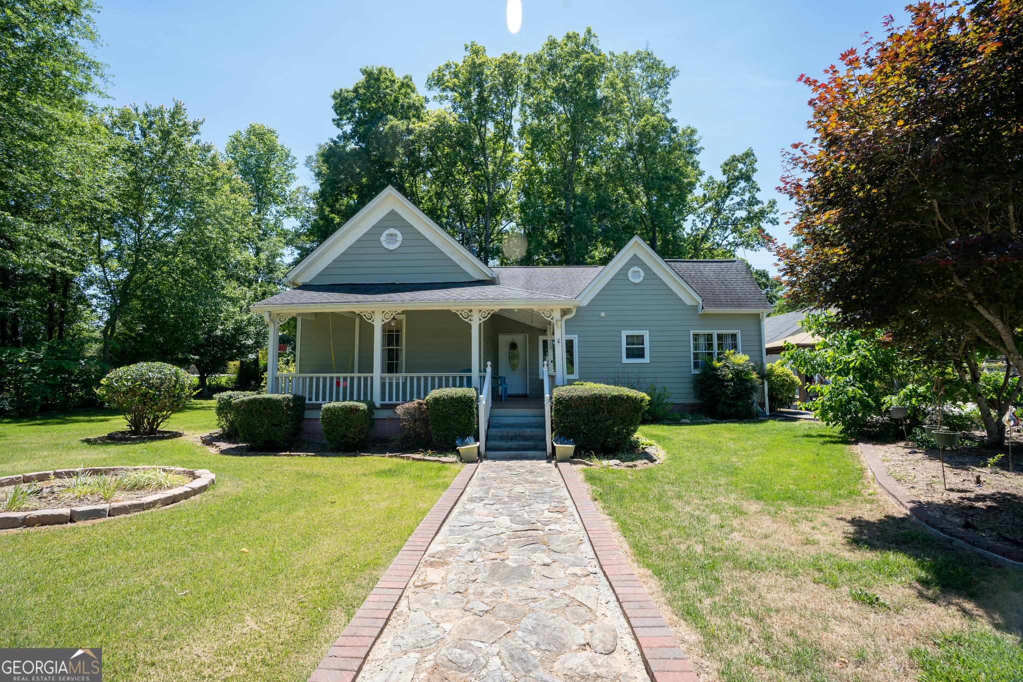 3 bedroom, 2 bathroom, 2,258 sq ft single family residence sold at 5945 Hopewell Road, Cumming, GA 30028