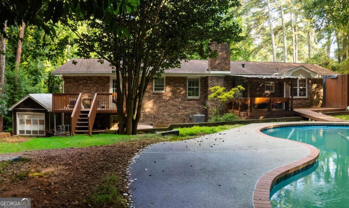 3 bedroom, 2 bathroom, 1,808 sq ft single family residence for sale at 5873 Button Gwinnett Place, Norcross, GA 30093 — photo 5