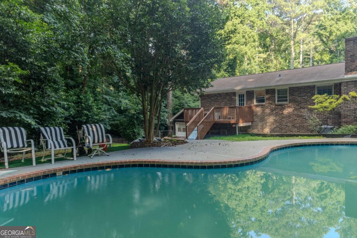 3 bedroom, 2 bathroom, 1,808 sq ft single family residence for sale at 5873 Button Gwinnett Place, Norcross, GA 30093 — photo 4