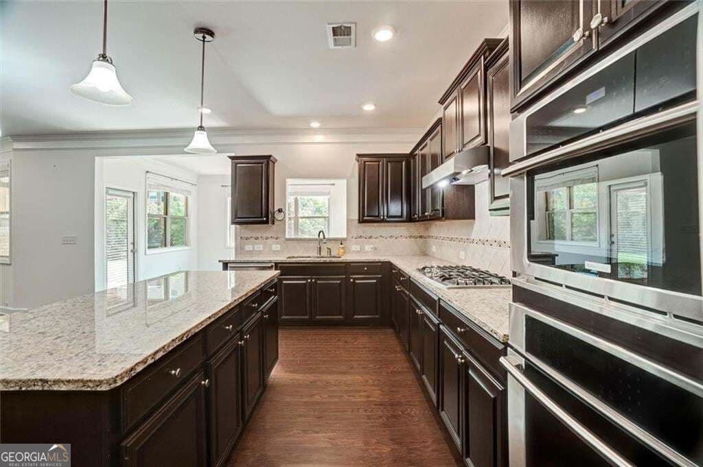 5 bedroom, 4 bathroom, 4,357 sq ft single family residence for sale at 1820 Stonington Drive, Cumming, GA 30041 — photo 6