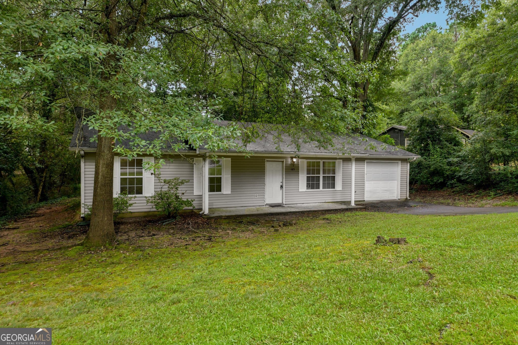 3 bedroom, 2 bathroom, 1,410 sq ft single family residence for sale at 103 N Circle Drive, Ellenwood, GA 30294 — photo 3