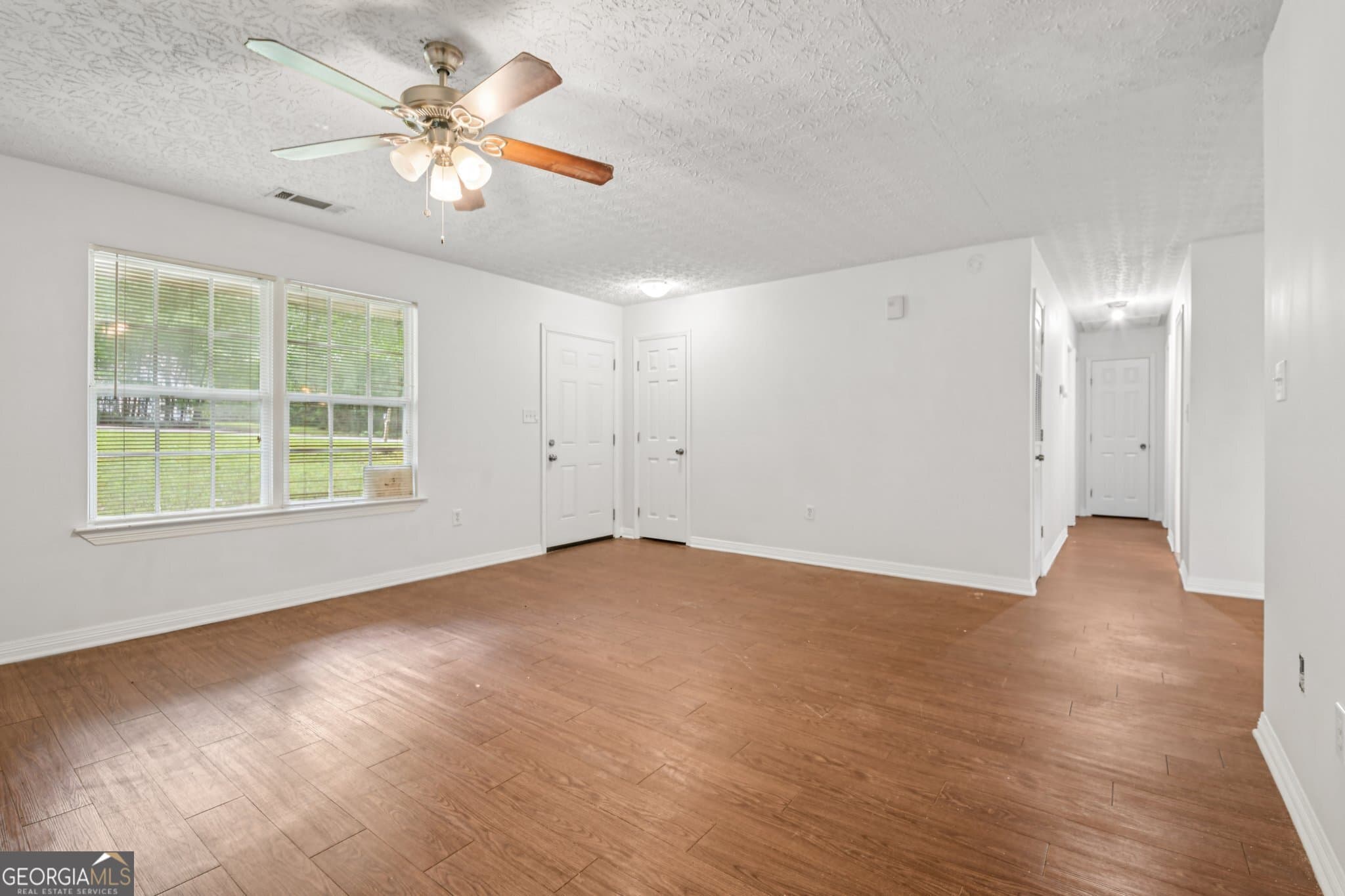 3 bedroom, 2 bathroom, 1,410 sq ft single family residence for sale at 103 N Circle Drive, Ellenwood, GA 30294 — photo 8