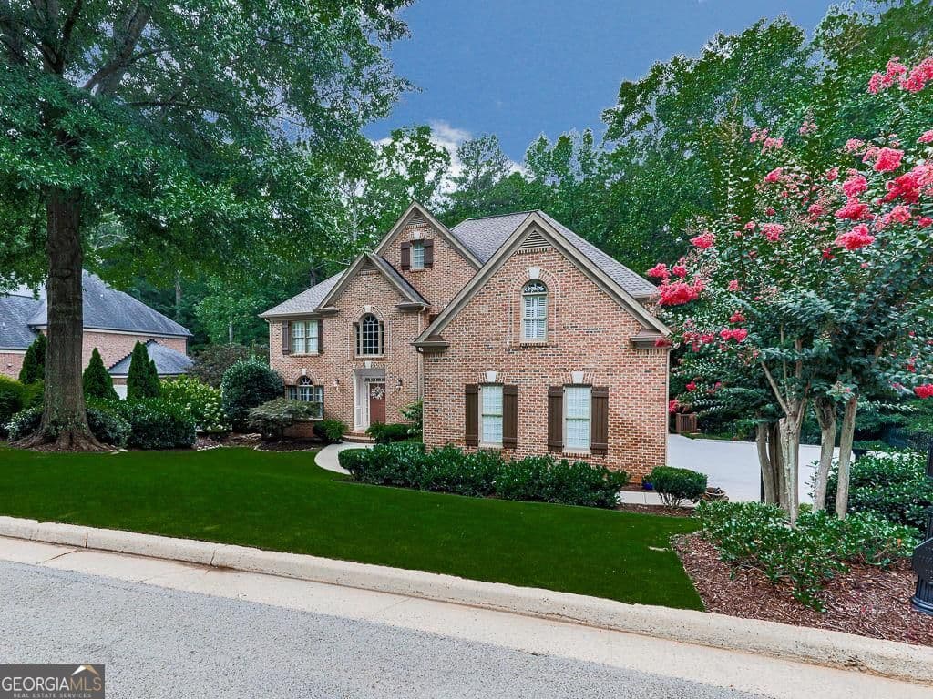 5 bedroom, 4.5 bathroom, 6,377 sq ft single family residence sold at 5037 Towne Lake Hills, Woodstock, GA 30189