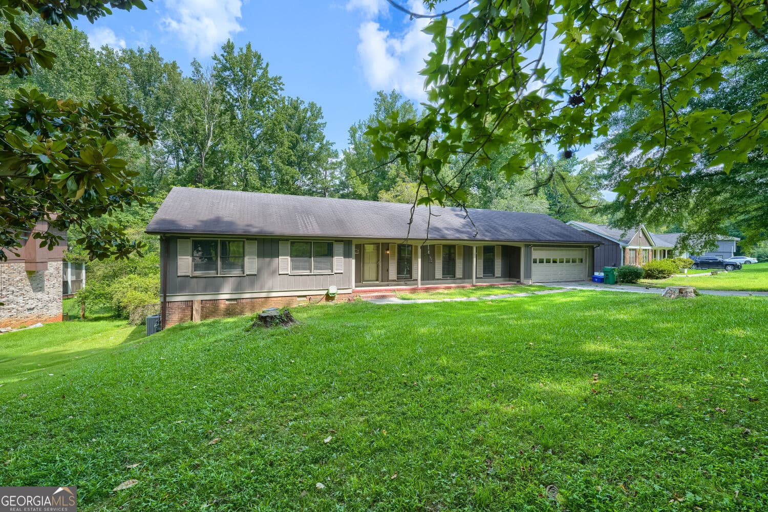 4 bedroom, 3 bathroom, 2,176 sq ft single family residence for sale at 4634 S Hope Springs Road, Stone Mountain, GA 30083 — photo 2