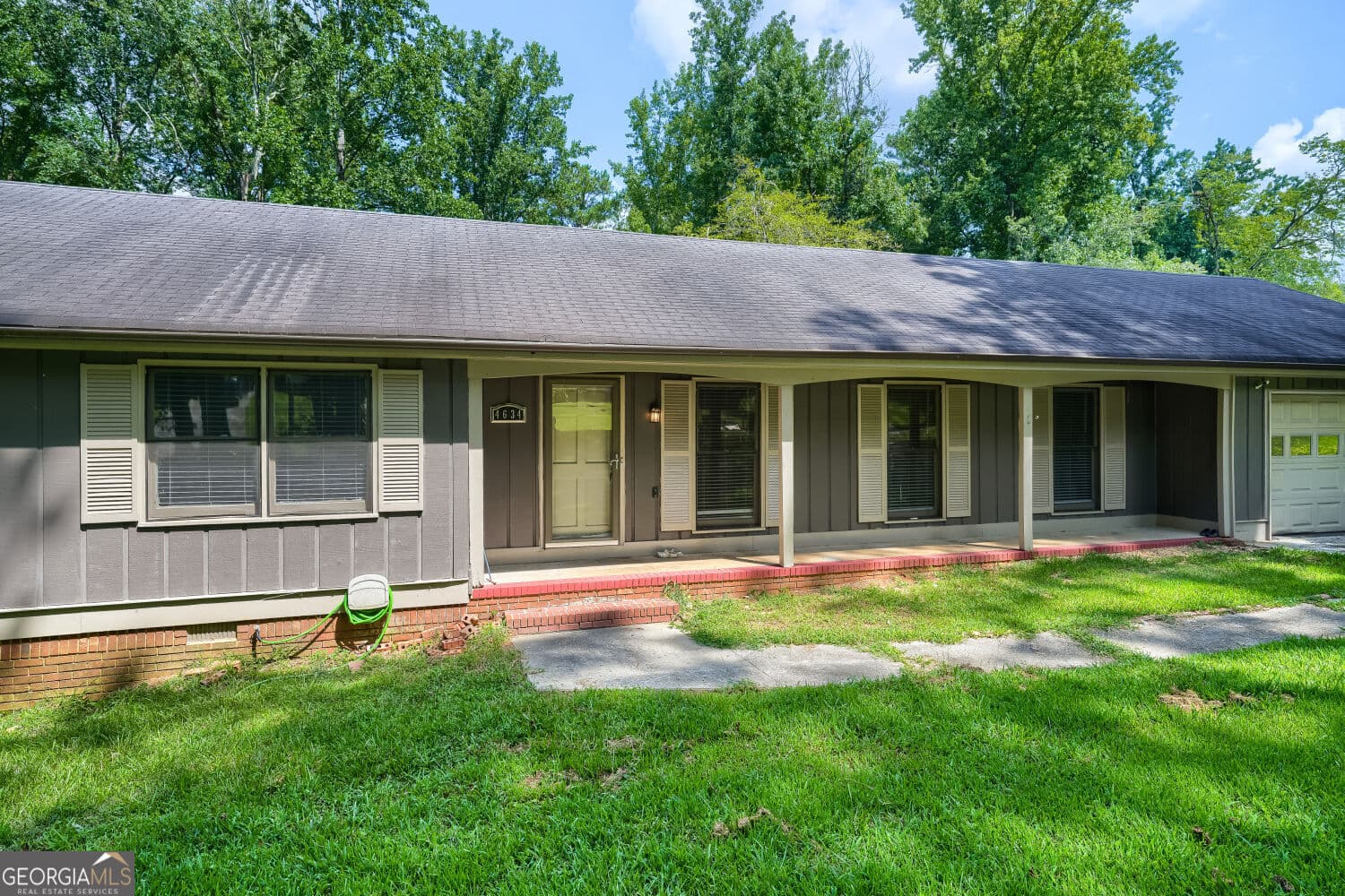 4 bedroom, 3 bathroom, 2,176 sq ft single family residence for sale at 4634 S Hope Springs Road, Stone Mountain, GA 30083 — photo 1 of 16