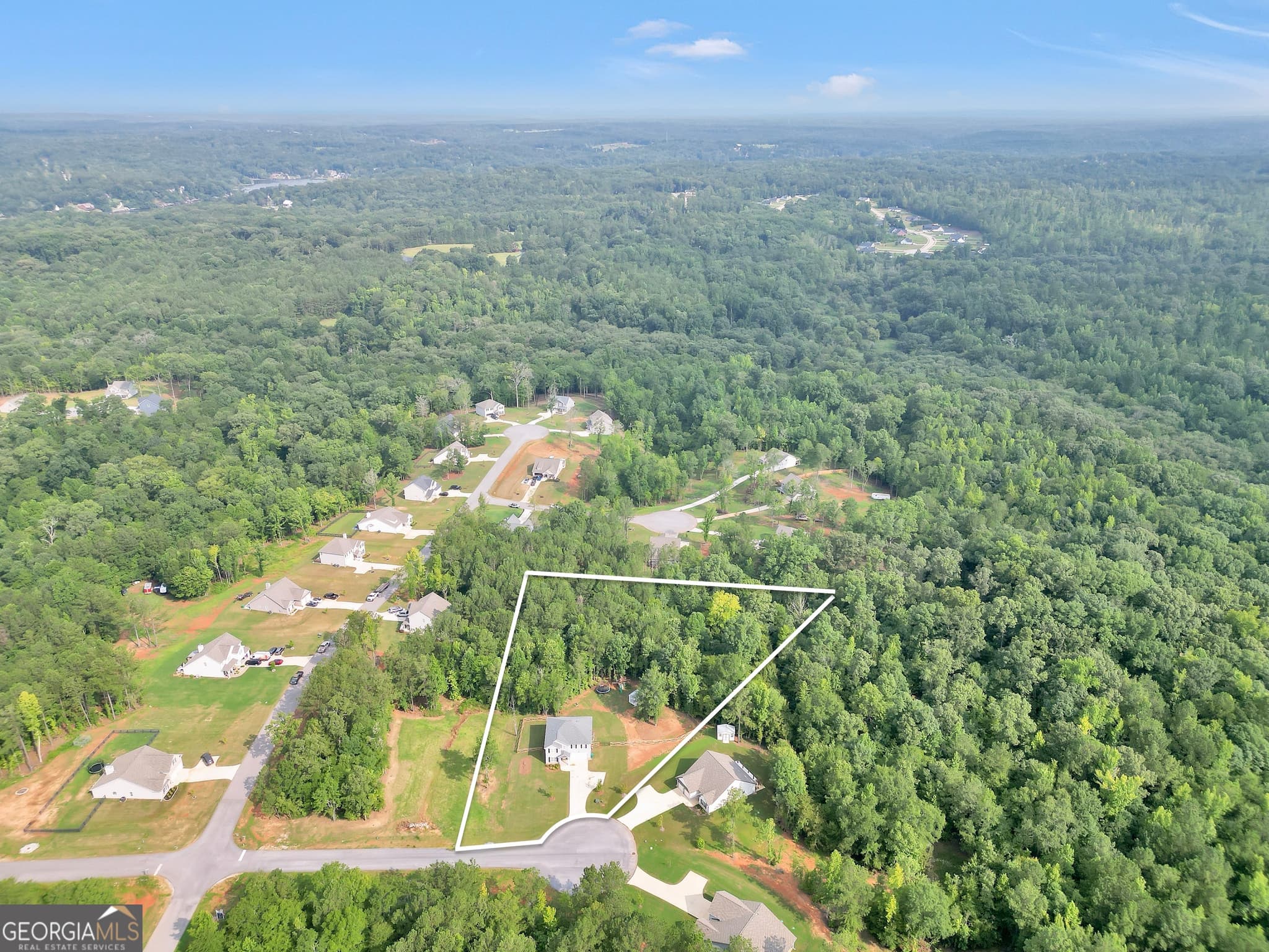 5 bedroom, 4 bathroom, 2,595 sq ft single family residence for sale at 201 Cooper Drive, Mansfield, GA 30055 — photo 2