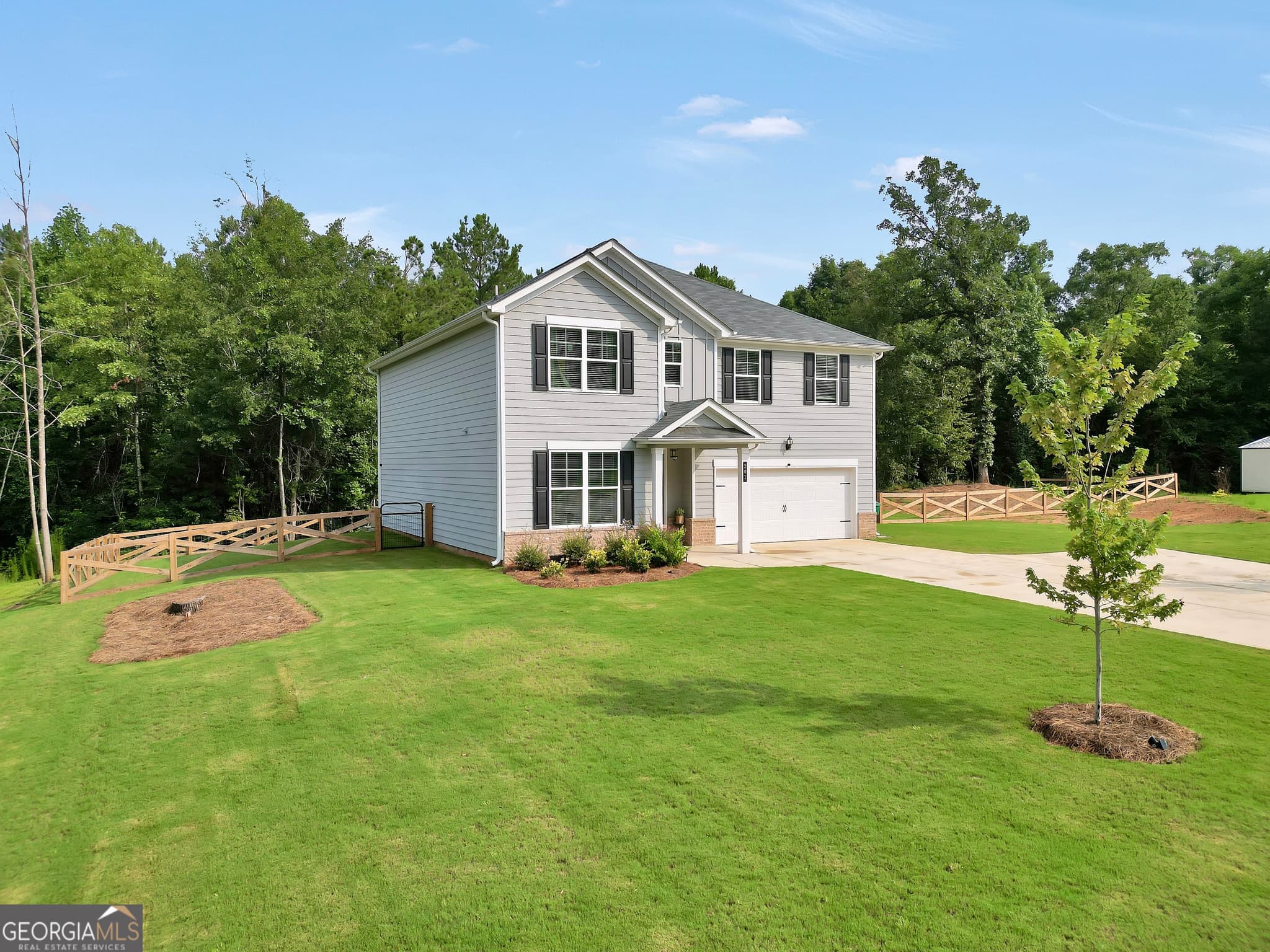 5 bedroom, 4 bathroom, 2,595 sq ft single family residence for sale at 201 Cooper Drive, Mansfield, GA 30055 — photo 7