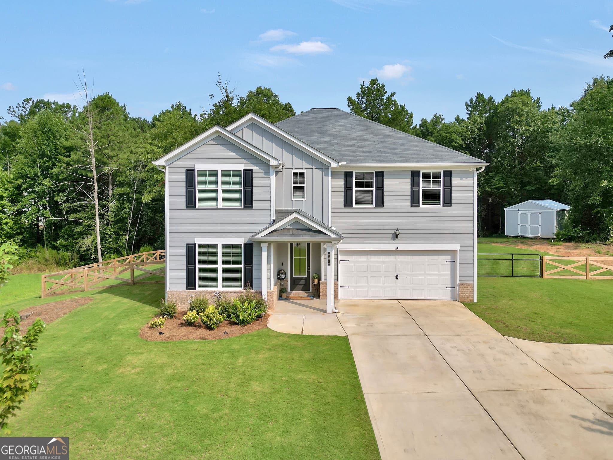 5 bedroom, 4 bathroom, 2,595 sq ft single family residence for sale at 201 Cooper Drive, Mansfield, GA 30055