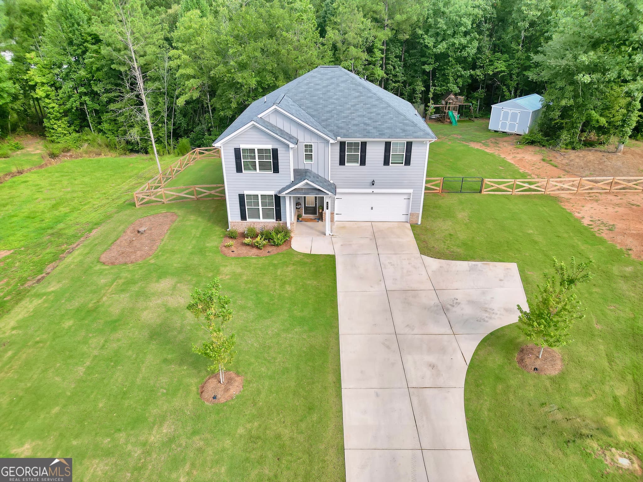 5 bedroom, 4 bathroom, 2,595 sq ft single family residence for sale at 201 Cooper Drive, Mansfield, GA 30055 — photo 9
