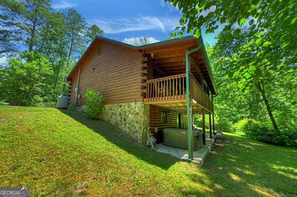 3 bedroom, 2 bathroom, 2,516 sq ft cabin,single family residence for sale at 6385 Hwy 2, Epworth, GA 30541 — photo 7