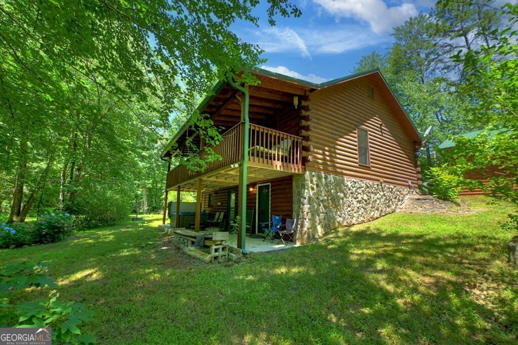 3 bedroom, 2 bathroom, 2,516 sq ft cabin,single family residence for sale at 6385 Hwy 2, Epworth, GA 30541 — photo 3