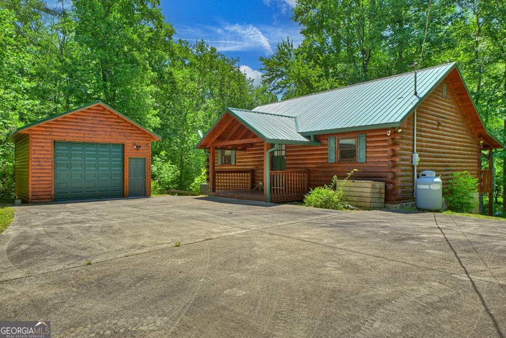 3 bedroom, 2 bathroom, 2,516 sq ft cabin,single family residence for sale at 6385 Hwy 2, Epworth, GA 30541
