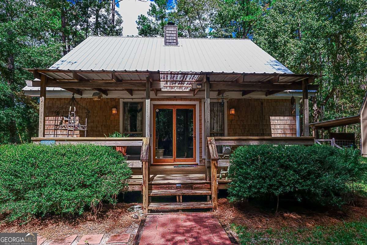 3 bedroom, 2 bathroom, 1,236 sq ft cabin,single family residence for sale at 401 Noel C Conaway Road, Guyton, GA 31312 — photo 3