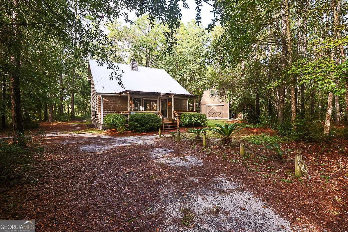 3 bedroom, 2 bathroom, 1,236 sq ft cabin,single family residence for sale at 401 Noel C Conaway Road, Guyton, GA 31312