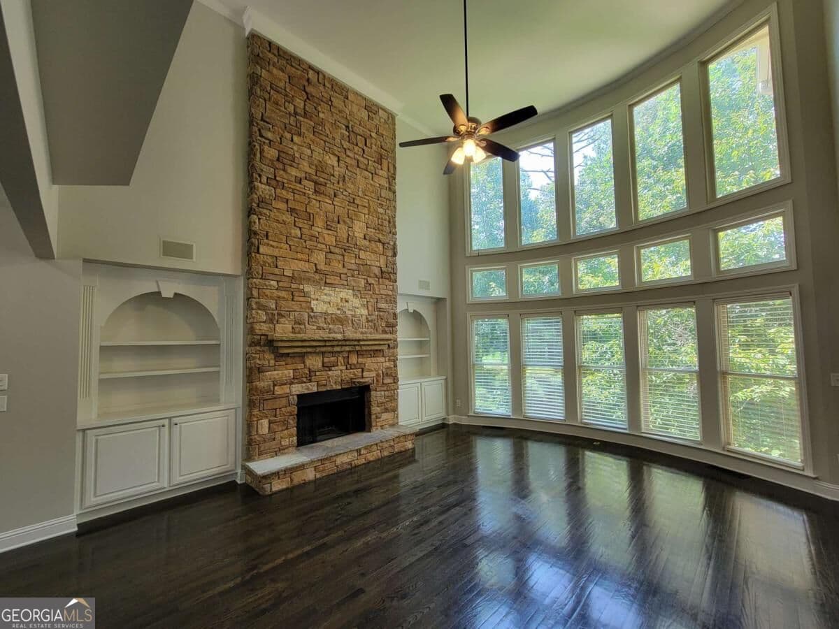 5 bedroom, 4.5 bathroom, 4,492 sq ft single family residence for sale at 6660 Granite Gate Pass, Cumming, GA 30028 — photo 6