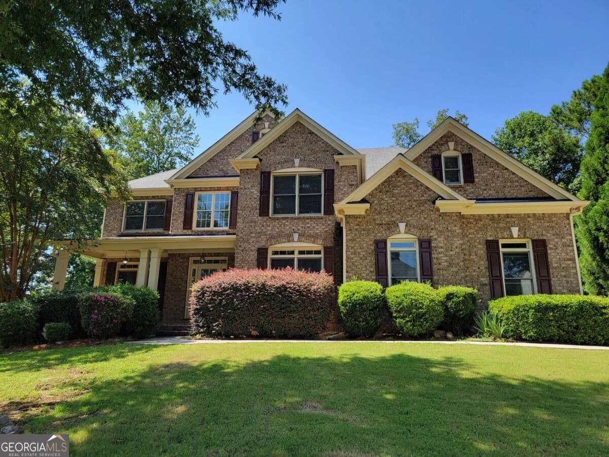 5 bedroom, 4.5 bathroom, 4,492 sq ft single family residence for sale at 6660 Granite Gate Pass, Cumming, GA 30028