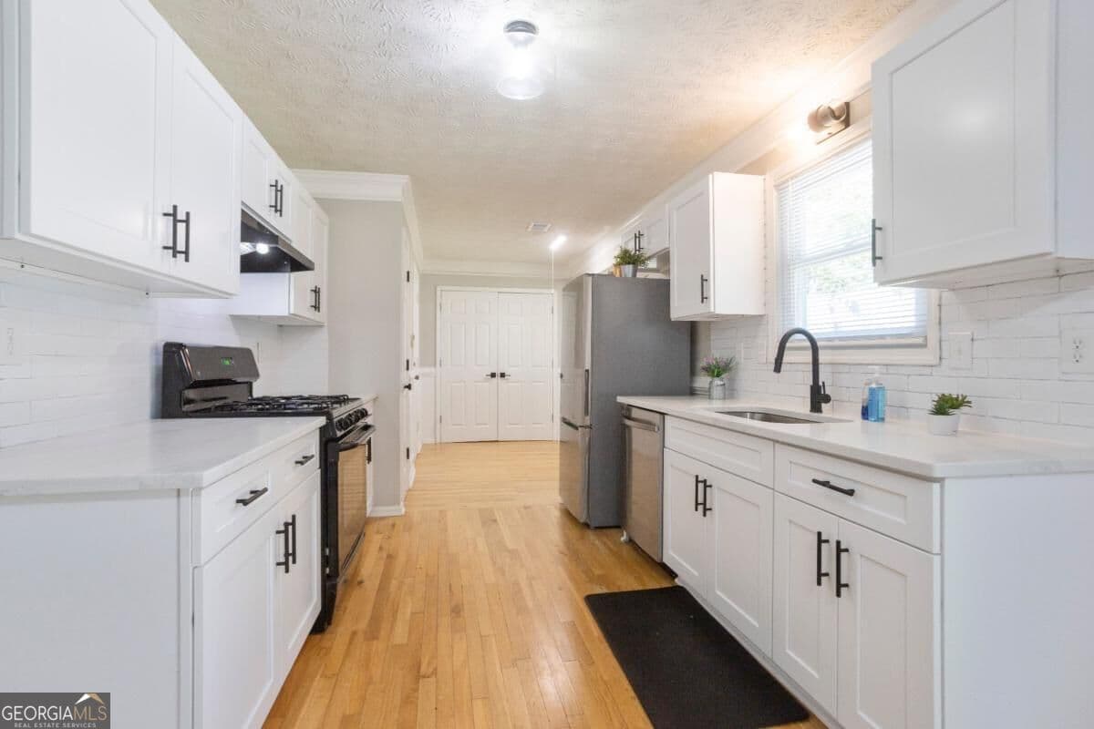 3 bedroom, 2 bathroom, 1,416 sq ft single family residence for sale at 1971 Marshes Glenn Drive, Norcross, GA 30071 — photo 7