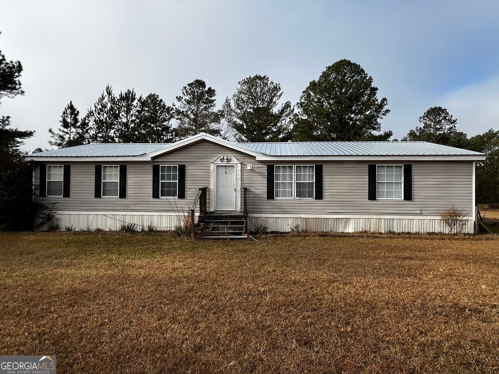 3 bedroom, 2 bathroom, 1,920 sq ft manufactured home,single family residence sold at 14381 Ollifftown Road, Metter, GA 30439