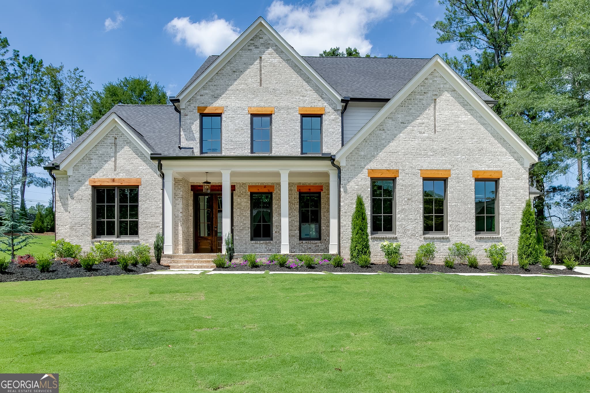 4 bedroom, 4.5 bathroom, 4,417 sq ft single family residence for sale at 2971 N Bogan Road 2, Buford, GA 30519 — photo 2