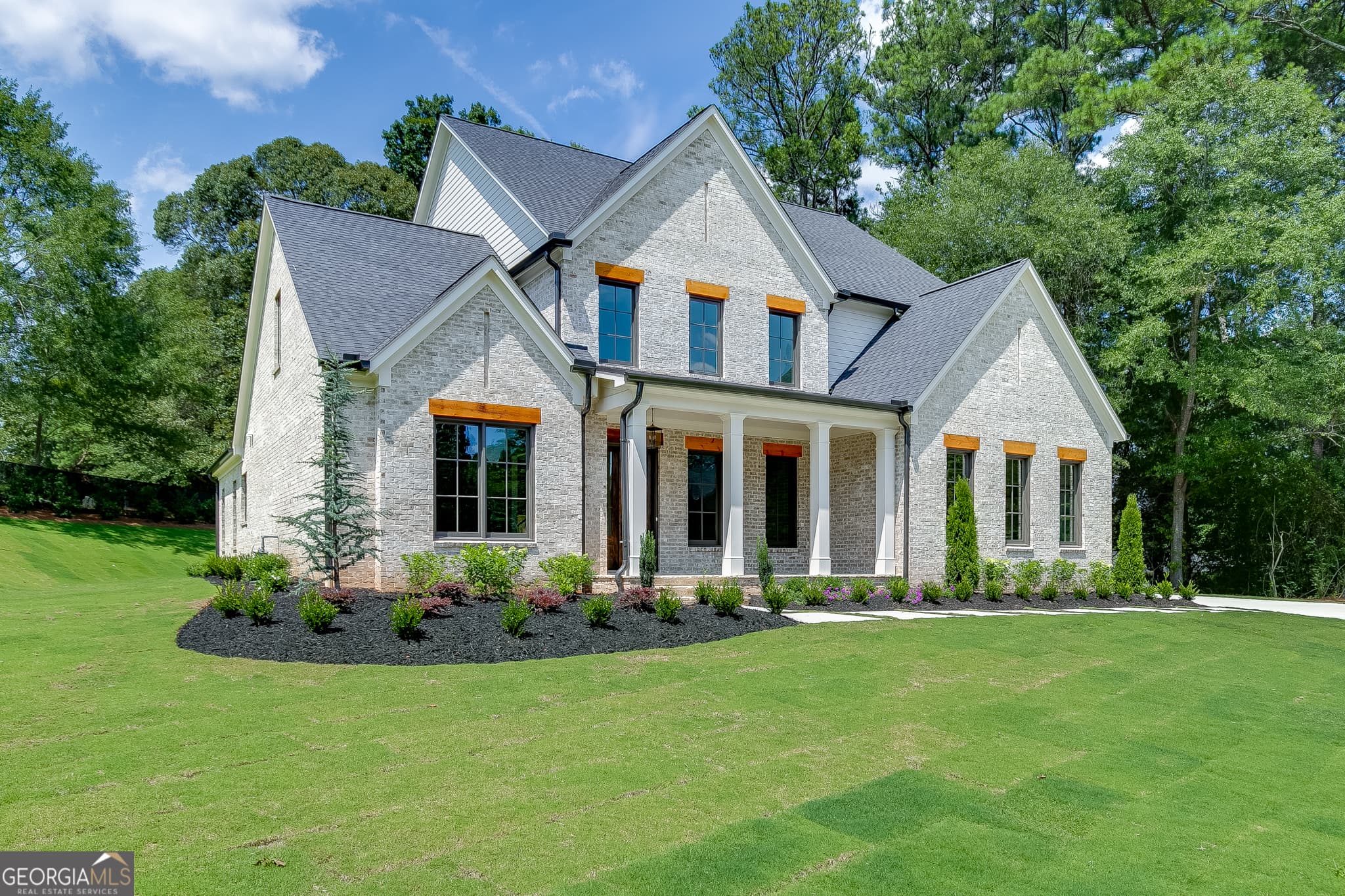 4 bedroom, 4.5 bathroom, 4,417 sq ft single family residence for sale at 2971 N Bogan Road 2, Buford, GA 30519 — photo 3