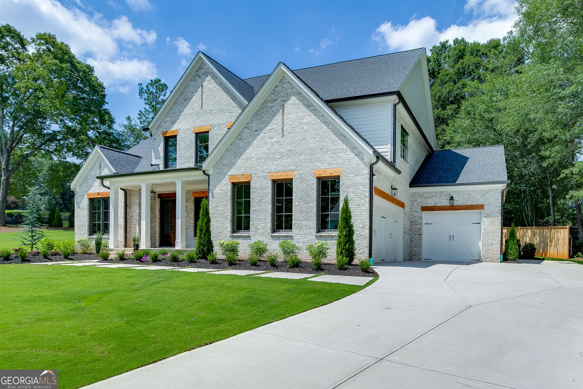 4 bedroom, 4.5 bathroom, 4,417 sq ft single family residence for sale at 2971 N Bogan Road 2, Buford, GA 30519 — photo 4