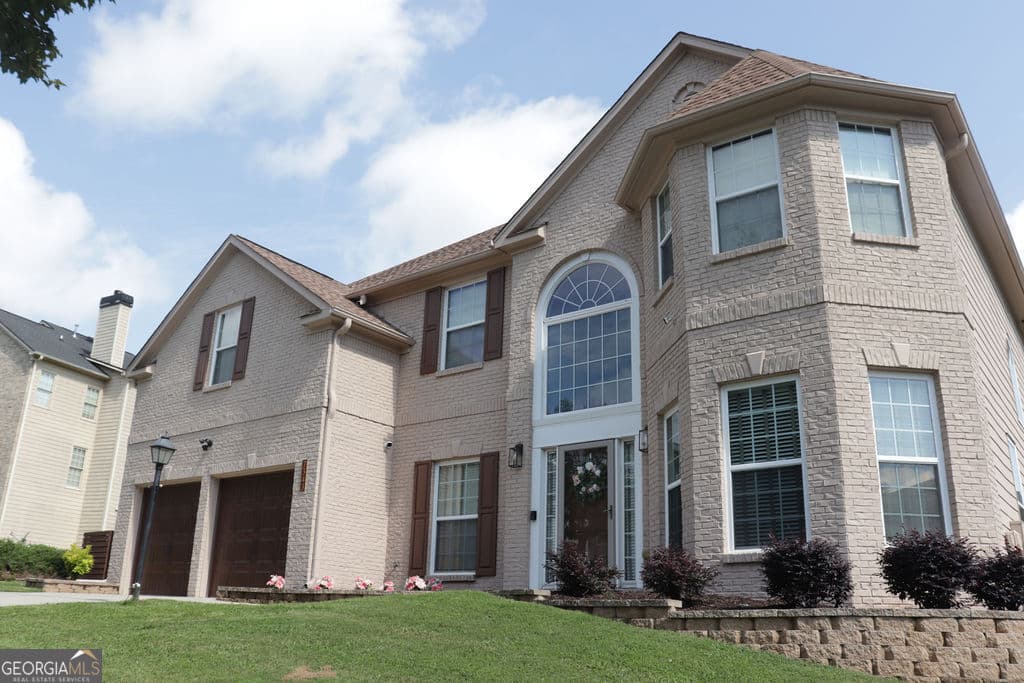 4 bedroom, 2.5 bathroom, 3,393 sq ft single family residence for sale at 7343 Simon Street, South Fulton, GA 30349 — photo 2