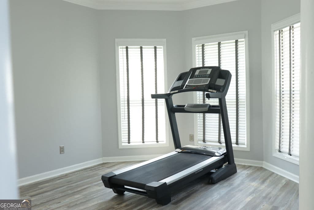 4 bedroom, 2.5 bathroom, 3,393 sq ft single family residence for sale at 7343 Simon Street, South Fulton, GA 30349 — photo 4
