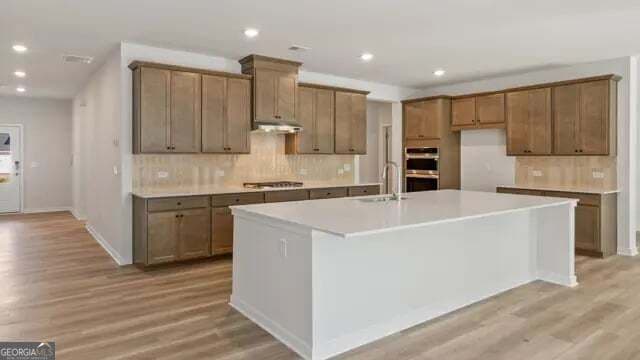 6 bedroom, 5.5 bathroom, 3,829 sq ft single family residence for sale at 3940 Silver Pine Trail, Cumming, GA 30028 — photo 5