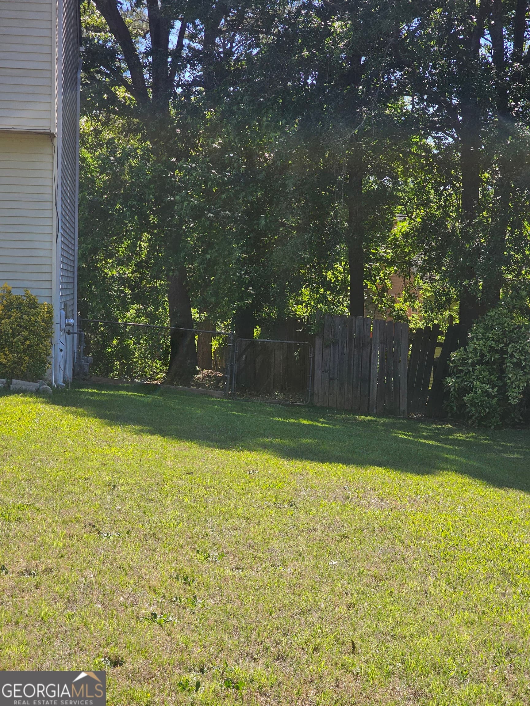 5 bedroom, 2.5 bathroom, 1,512 sq ft single family residence for sale at 6642 Doublegate Lane, Rex, GA 30273 — photo 4