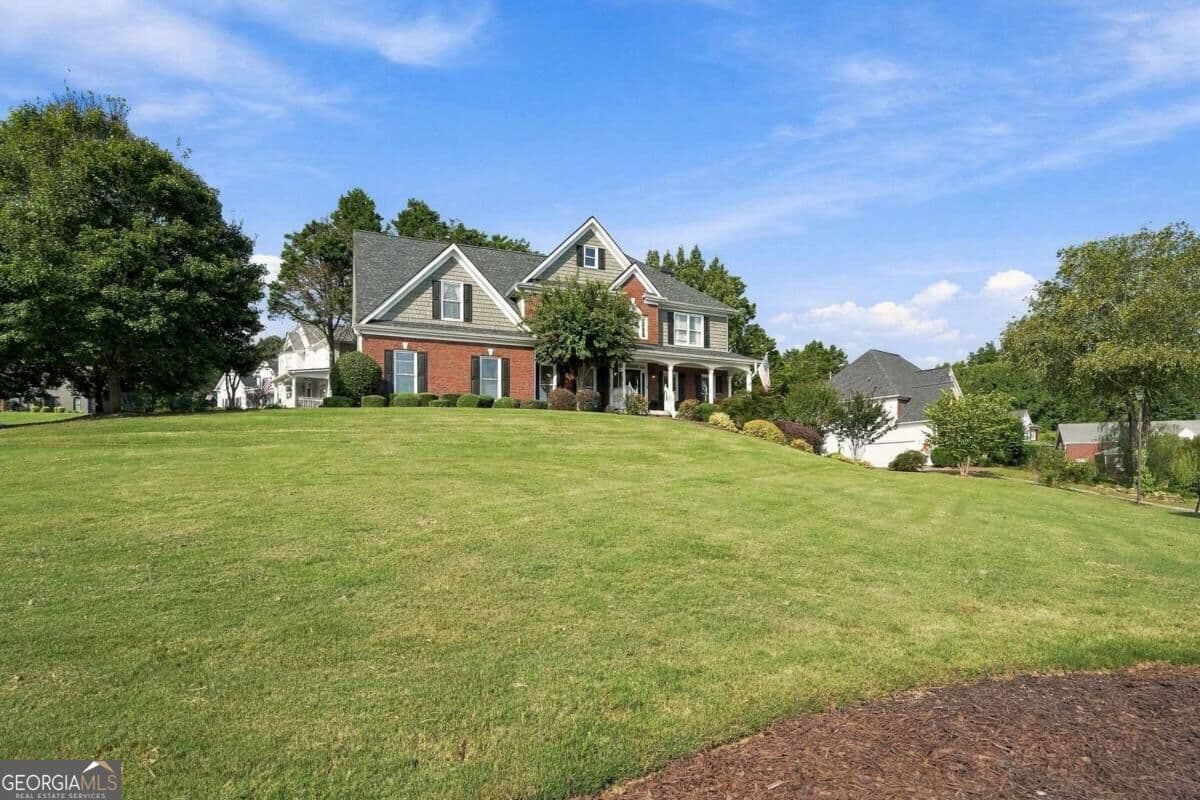 5 bedroom, 3.5 bathroom, 3,861 sq ft single family residence for sale at 4910 Montclair Trail, Cumming, GA 30040 — photo 3