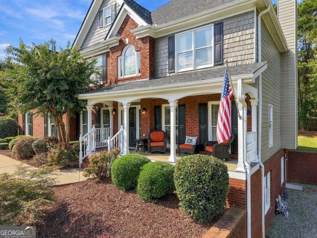 5 bedroom, 3.5 bathroom, 3,861 sq ft single family residence for sale at 4910 Montclair Trail, Cumming, GA 30040 — photo 4